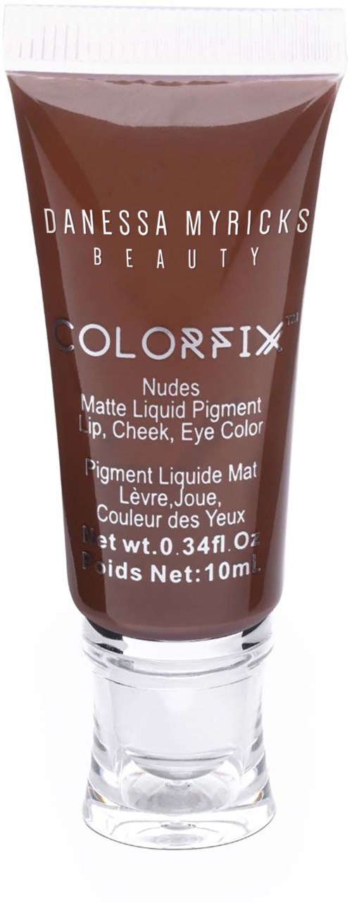 A brown tube of lipstick with white text, labeled as a matte liquid pigment for lips, cheeks, and eyes.