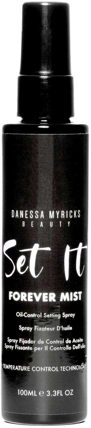 A black spray bottle labeled 'Forever Mist' by Danessa Myricks Beauty, used for setting makeup.