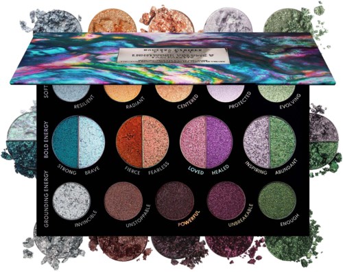This is a makeup palette with colorful powders labeled with positive words like 'brave', 'fearless', and 'powerful'.