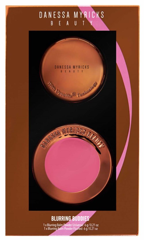 A makeup set with two pink and brown blushers in a pink, orange, and brown box, labeled 'Blurring Buddies'.