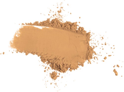 Ett beige pulver som är spillt med några spridda bitar runt omkring.
