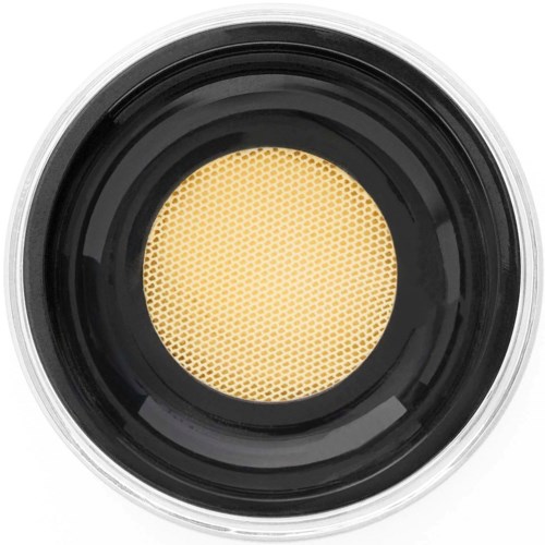 Close-up van een gele make-up spons met getextureerd oppervlak in een zwarte container.