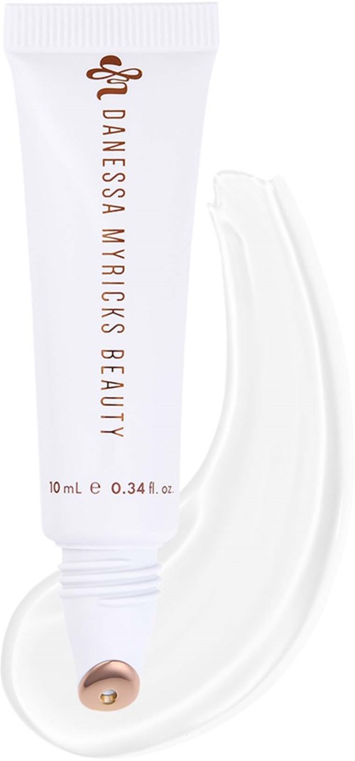 Danish skincare product with a white tube, gold logo, and a small amount of cream squeezed out.