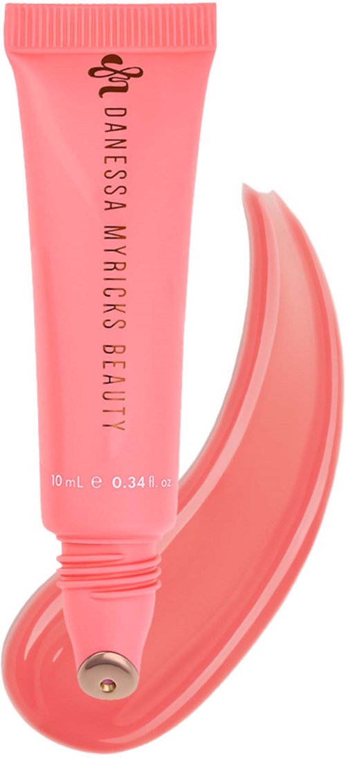 Pink tube of skincare product with a silver cap, and a swatch of product next to it.
