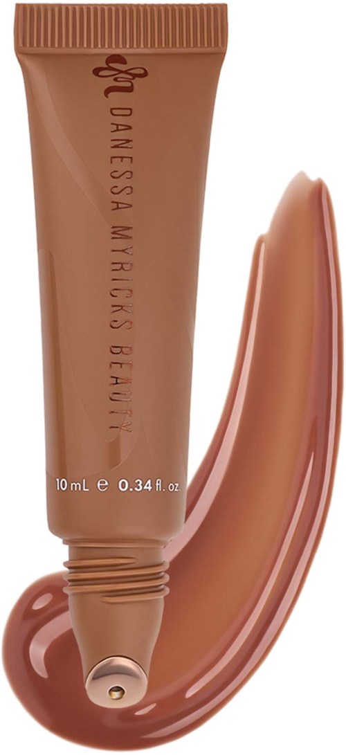 A 10 ml tube of foundation with a swatch of the product spread beside it in beige color.