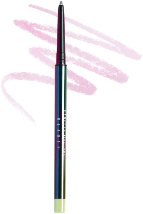Makeup-pensel i lilla og grønt med L'Oréal-logo, rosa makeup-streger i baggrunden.