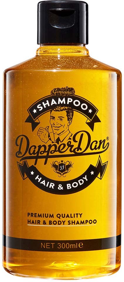 En gul flaska Dapper Dan-schampo med svart lock och en logga av en man med slickat hår.