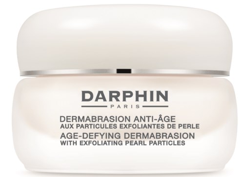 En vit burk med svart text märkt 'Darphin Paris' som det står att det är en åldersförebyggande dermabrasion med pärlpartiklar.