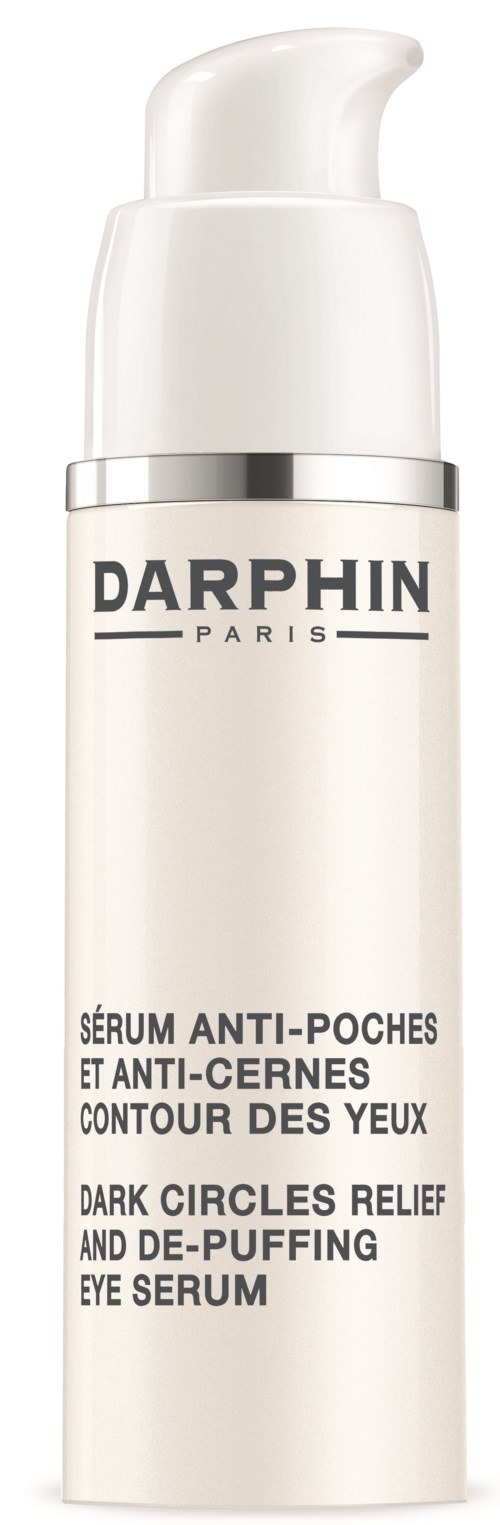En hvit flaske med pumpe, merket Darphin Paris mørke ringer øyeserum for hevelse og lindring.