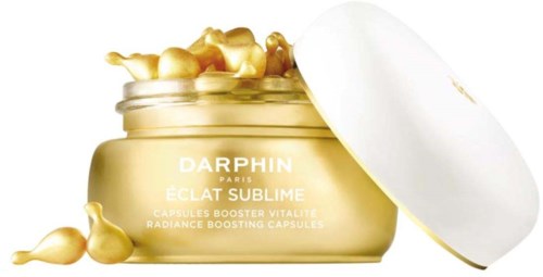 En guldburk med kapslar inuti, märkt Darphin Paris Eau Sublime, för att öka hudens vitalitet.