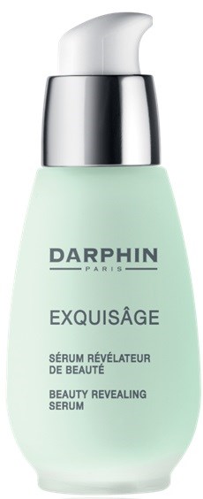 Eine hellgrüne Flasche mit weißem Pumpen, beschriftet Darphin Exquisage Schönheit Serum.