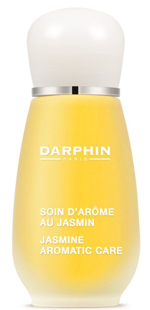 Eine gelbe Flasche mit weißem Deckel, beschriftet Darphin Jasmine Aromatic Care für Duft- und Hautpflege.