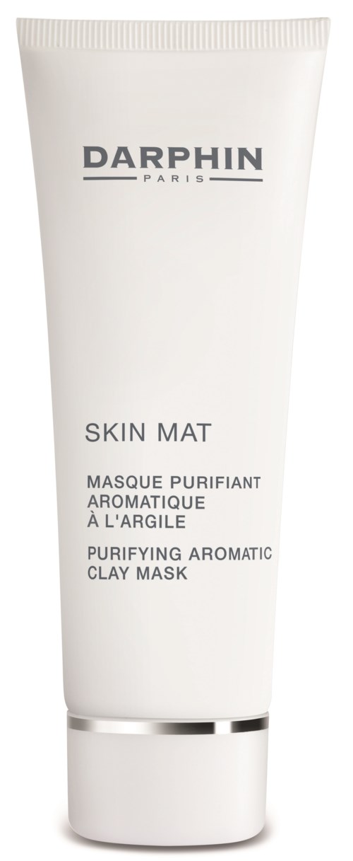 En hvit tube med svart tekst, merket Darphin Skin Mat Purifying Aromatic Clay Mask.