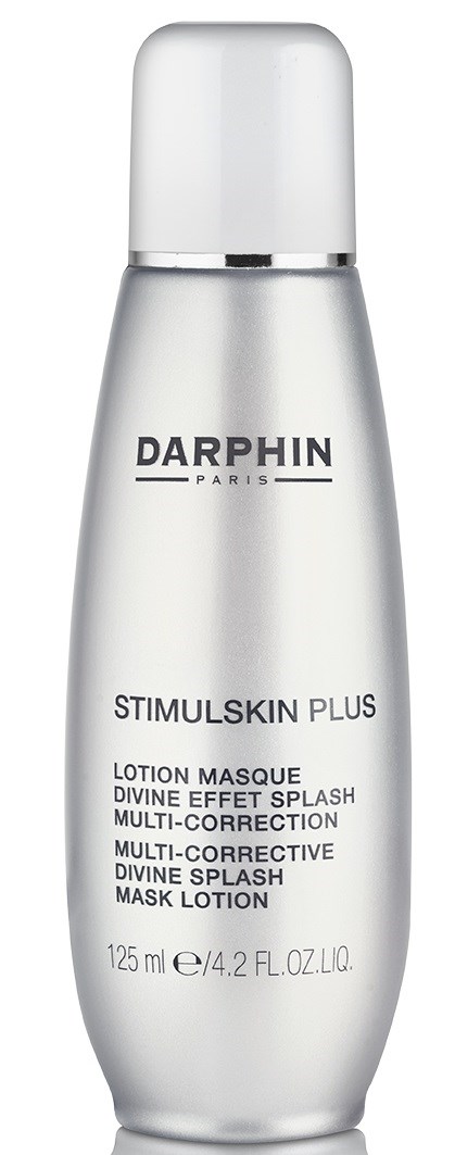 En sølvfarget flaske med hvit hette merket Darphin Paris, inneholder StimuliSkin Plus maskelotion for hudpleie.
