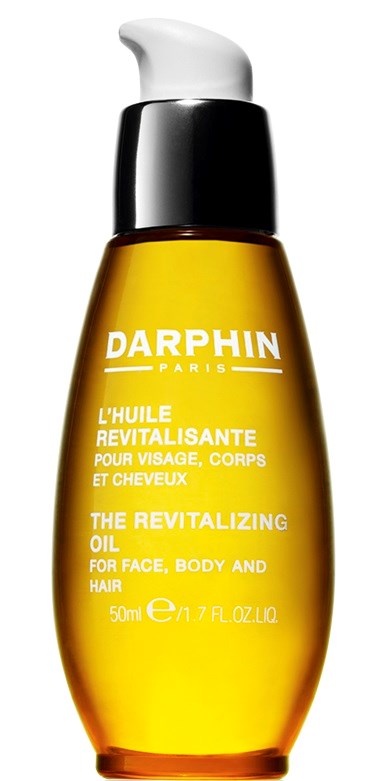 En gul flaske med hvit pumpe, merket Darphin Paris, for ansikts-, kropp- og hårolje. Liten størrelse, 50 ml.