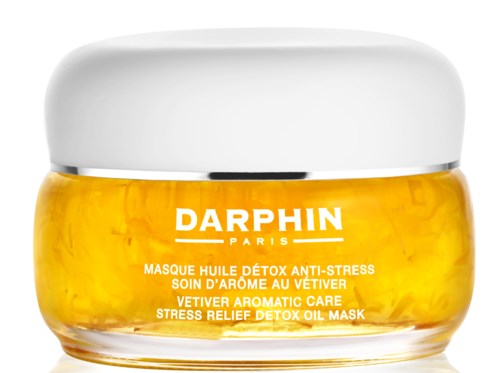 En beholder med detox-anti-stress olie-maske med hvid låg og gul indhold, mærket med produktdetaljer.