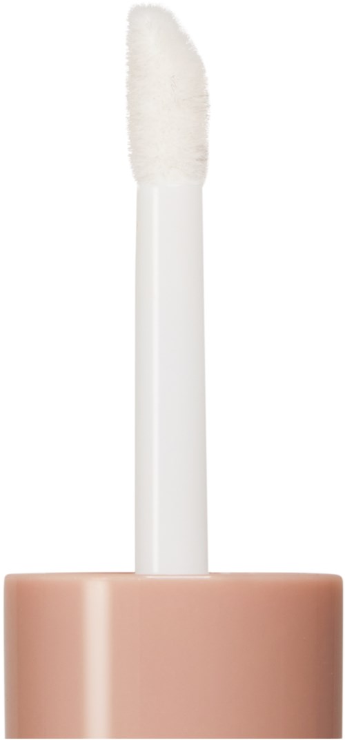 A white lip gloss applicator with a fuzzy tip and a beige cap.