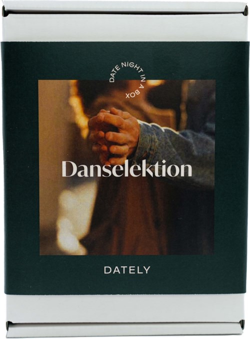 En kalender med et bilde av et dansepar og ordet "Danselktion".