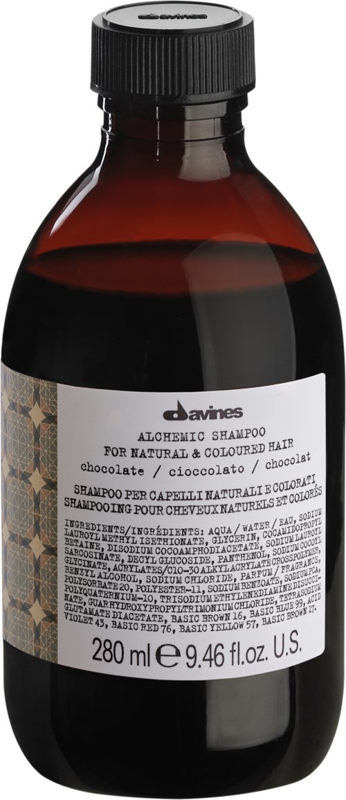 En brunt flaska med svart lockor innehåller alkemiskt schampo för naturligt och färgat hår, 280 ml.
