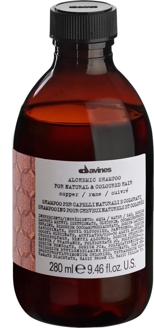 En brun plastflaske med svart lokk som inneholder sjampo for naturlig hår og kobberfarge. 280 ml.