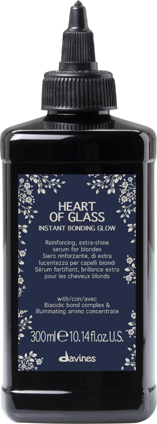 En svart flaska med droppare, märkt 'Heart of Glass' serum för blont hår, 300 ml, från Davines.