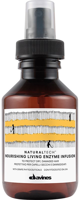 Brun flaska med sprayhuva. Etiketten säger 'NaturalTech Nourishing Living Enzyme Infusion' för hårvård.