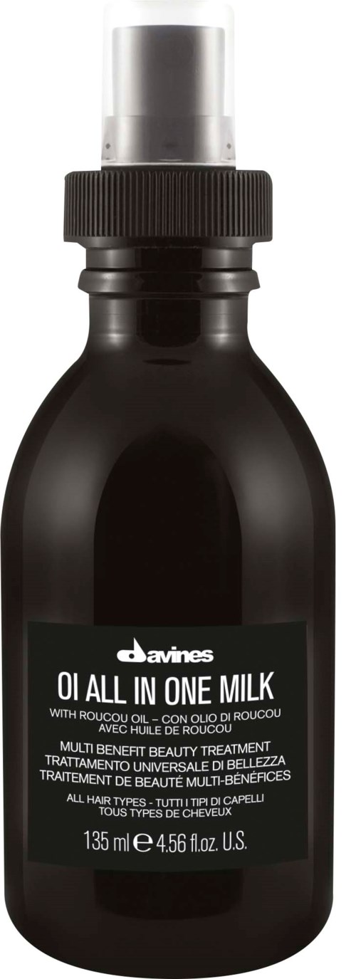 Black bottle with a spray top, labeled as oil for hair, contains 135 ml or 4.56 fl oz. 