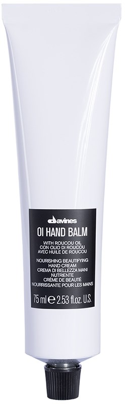Hvid tube med Davines oil hand balm med sort mærke, 75 ml. Nærende hudplejeprodukt.