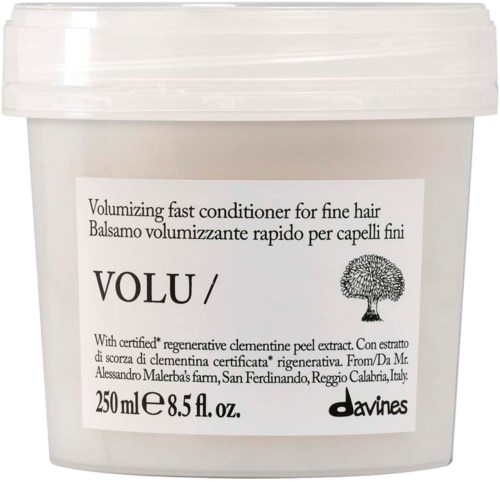 Behållare med volymgivande snabbbalsam för fint hår med en cederträdillustration och produktdetaljer på engelska och italienska.
