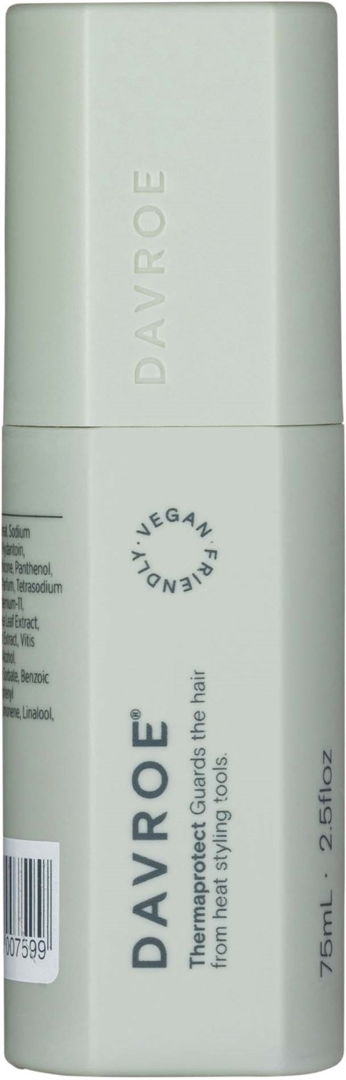 En hvit flaske med DAVROE varmebeskyttelse for hår, enkel design, merket som vegansk, 75 ml/2,5 fl oz.