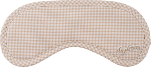 En beige och vitt rutigt sovmask med rundade kanter och märket 'dayDream' på.