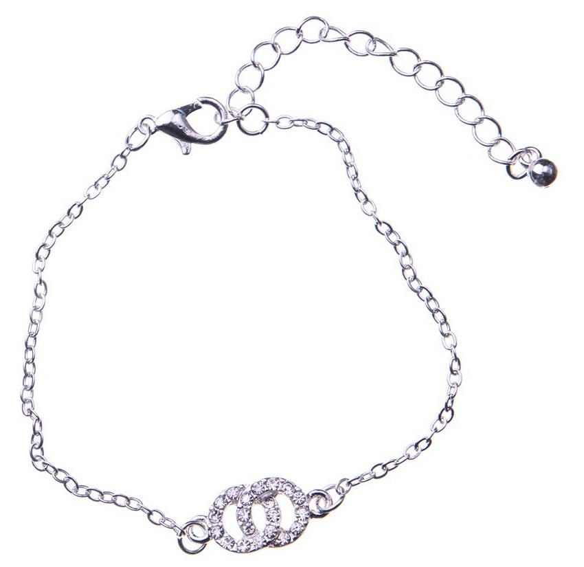 Dazzling Bracelet in silver col, two circles joined w crysta