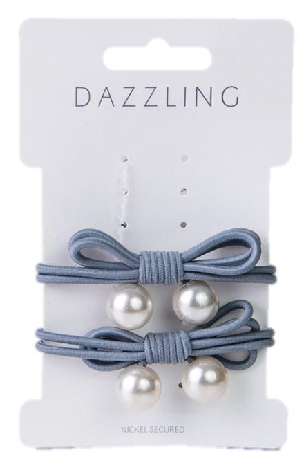 Ett set med tre blå hårband med pärldekorationer på ett vitt kort som heter 'Dazzling'.