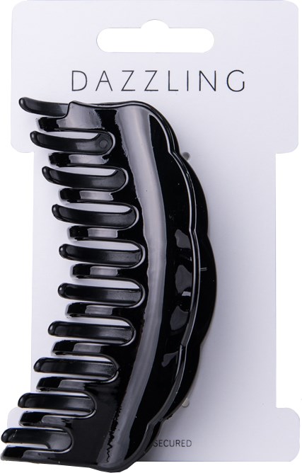 En svart hårklämma på ett vitt kort med texten 'Dazzling'.
