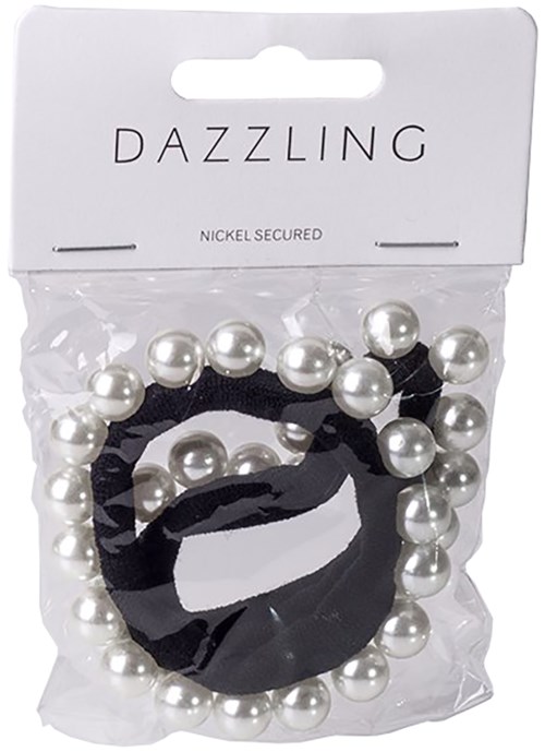 En påse med pärlliknande hårband och ett svart elastiskt band, märkt 'Dazzling'.