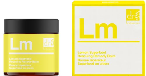 En gul burk och förpackning av citron superfood räddningsbalsam med svart lock, märkt med stor "Lm" och liten text.