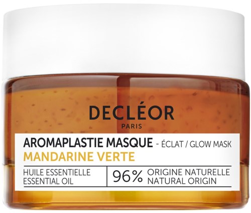 En brun krukke med hvit lokk merket 'DECLEOR PARIS' og 'Mandarine Verte'. Det er en glødemaske med essensiell olje.