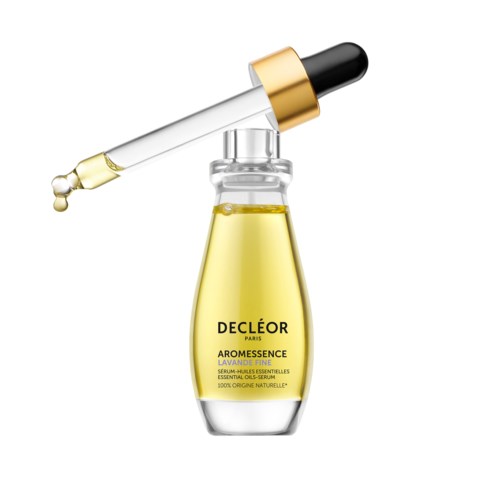 En glasflaske med gylden olie og pipette, mærket 'DECLéOR Paris Aromessence Lavande Fine' til hudpleje.