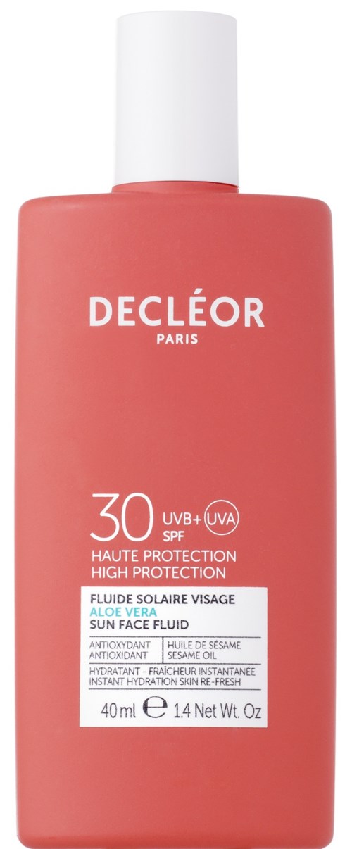 En korallfärgad solskyddsflaska med vitt lock, märkt Decleor Paris, SPF 30, innehåller aloe vera, solskyddsfluid för ansiktet.