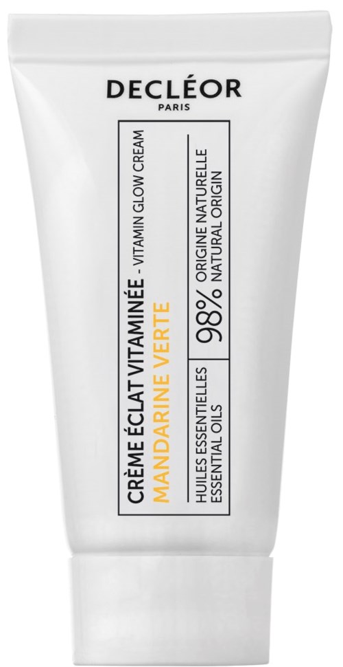 En vit tub med Decleor Vitamin Glow Cream, med svart och orange text, visar att den är för trött hy. 98% naturlig.