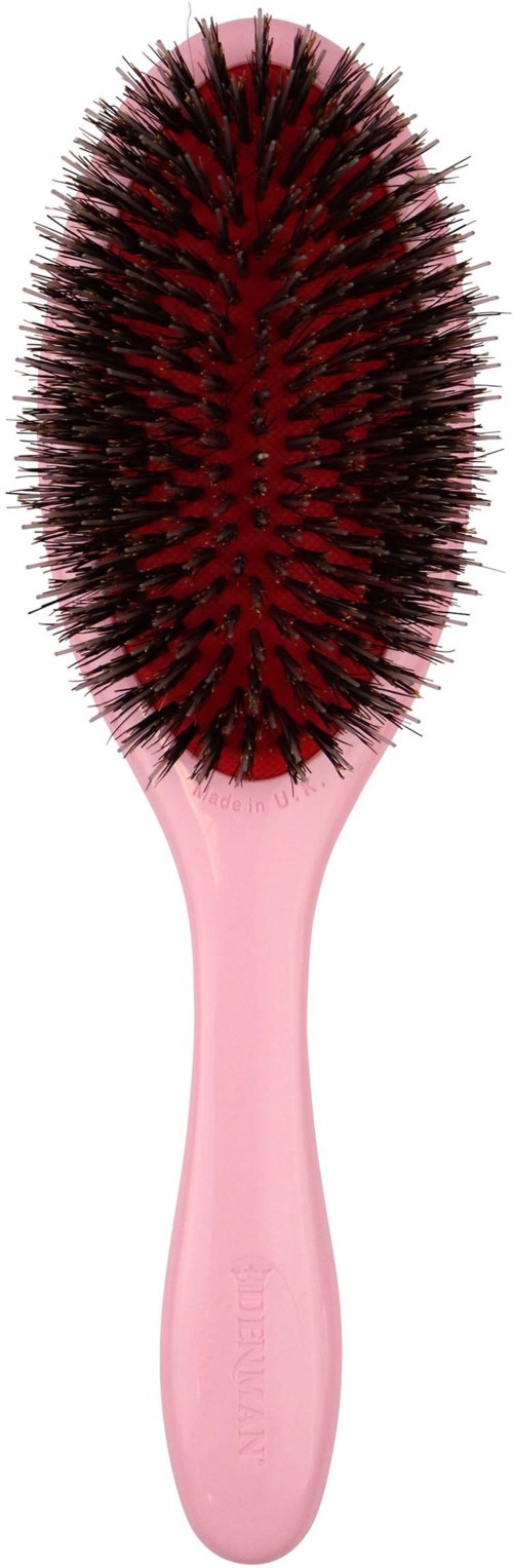 A pink hairbrush with black and red bristles, oval shape, and a handle.