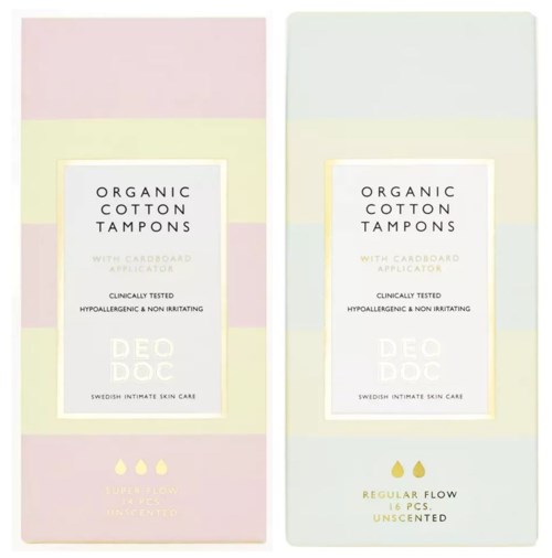 To bokse med økologiske bomuldstampon, den ene med pink og gul design, den anden blank hvid, mærket som uparfumeret.