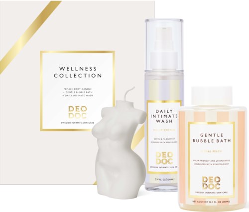Ett wellness-sets inkluderar ett kvinnligt kroppljus, intimtvätt och bubble bath med mjuka persiko- och gulddetaljer.