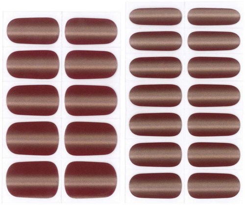 Two sheets of brown, oval-shaped tablets arranged in rows and columns, organized in a grid pattern.