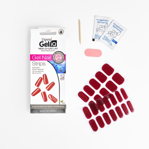 Nail gel strips, small nail file, alcohol wipes, and wooden stick are arranged on a white surface.