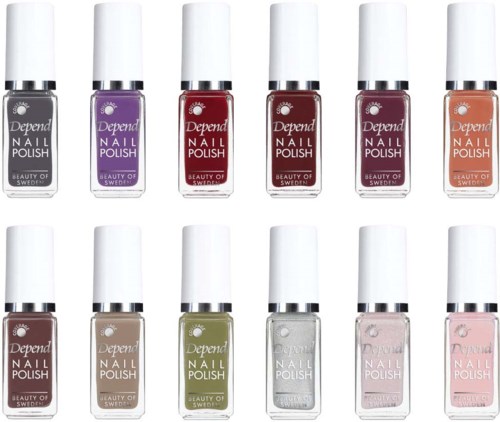 En rad med tolv Depend nagellacksflaskor i olika färger med vita lock och etiketter, arrangerade prydligt.