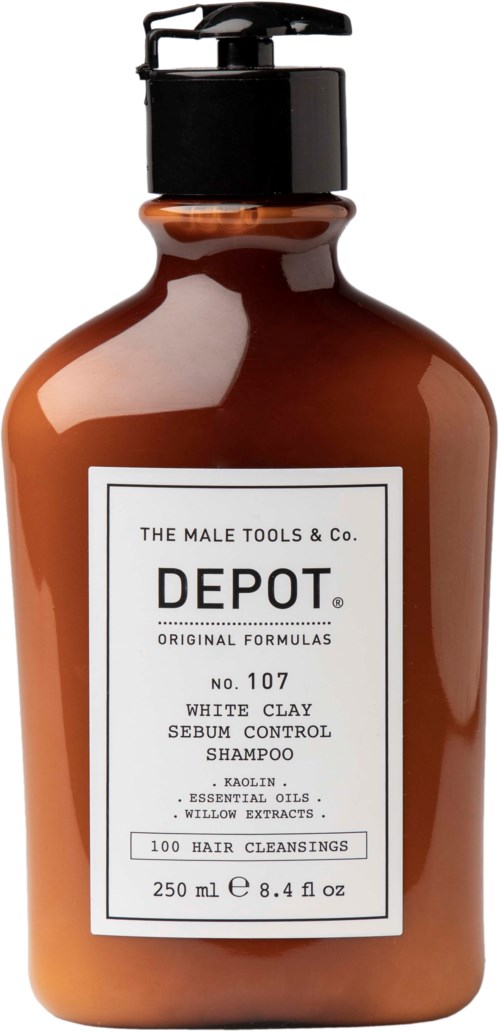 A brown bottle with a black pump contains shampoo for men's hair, featuring white clay and natural ingredients.