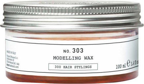 Small jar labeled 'Modelling Wax' for 300 hair stylings, made in Italy, with a silver lid.