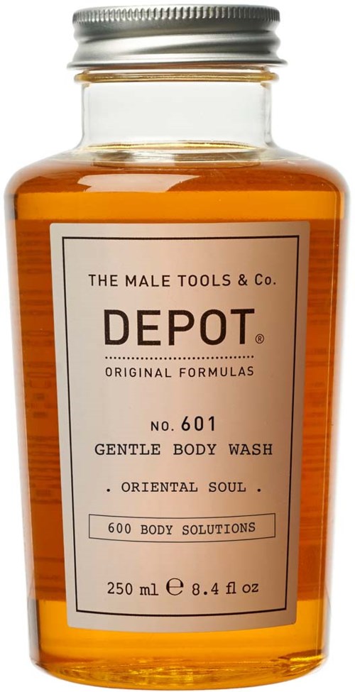 En transparent flaska med orange vätska, etikett som säger 'Depot Gentle Body Wash, 250ml' och listar funktioner som 'Original Formulas' och '600 Body Solutions.'