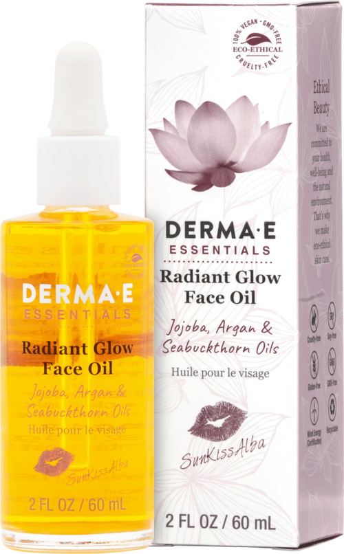 A small bottle of yellow face oil with dropper and a pink and white box, both labeled 'Radiant Glow Face Oil' with lotus flower image.